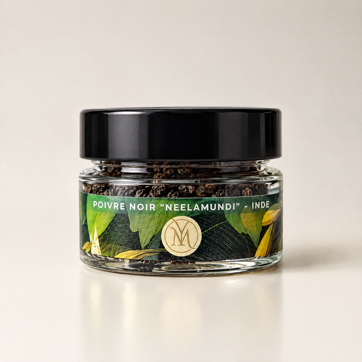 Pot en verre de poivre « Neelamundi » d'Inde, vu de face